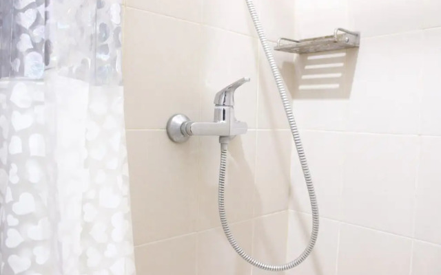 Compact Studio Room at Sudirman Suites Apartment