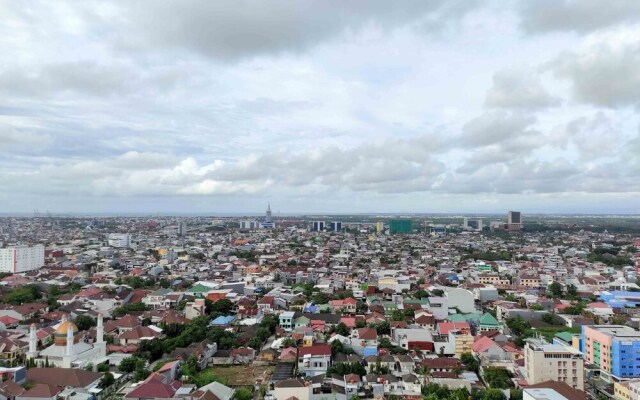 Vibrant 2BR at Vida View Makassar Apartment