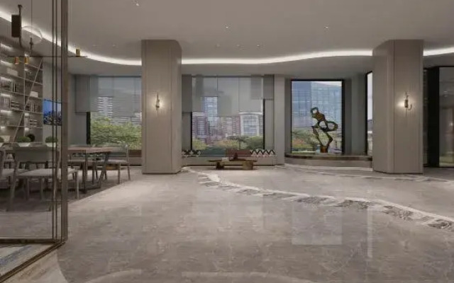 Wansheng Garden Hotel (Xinyang Luoshan Xiya Libao Plaza Branch)