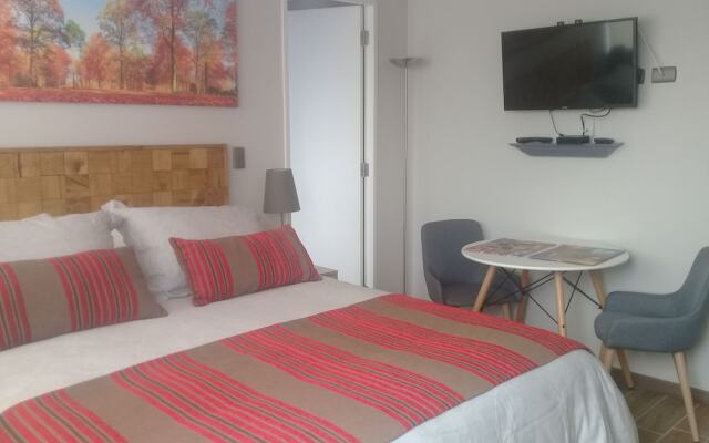 Plaza Parque Suites