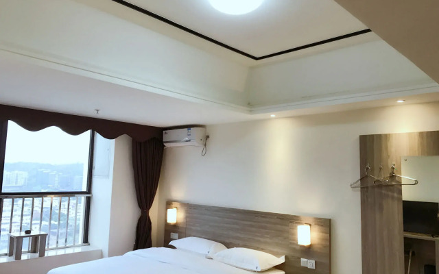 Xingyue Apartment Luogang Wanda