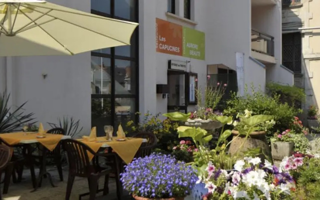 Logis Palais Des Fleurs Restaurant Les Capucines