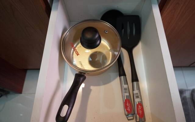 Homey and Warm 2BR Green Pramuka Apartment