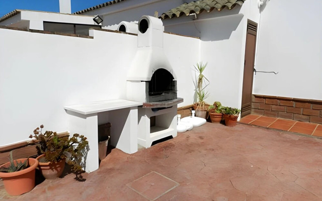 Apartamentos piscina compartida