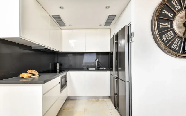 Modern Gem with Stunning Balcony by Sea N Rent