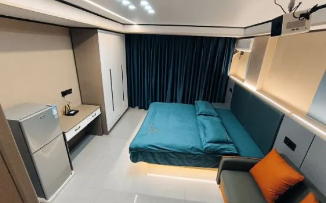 Hengdian Chunai Smart Apartment (Mingqing Gongyuan Branch)