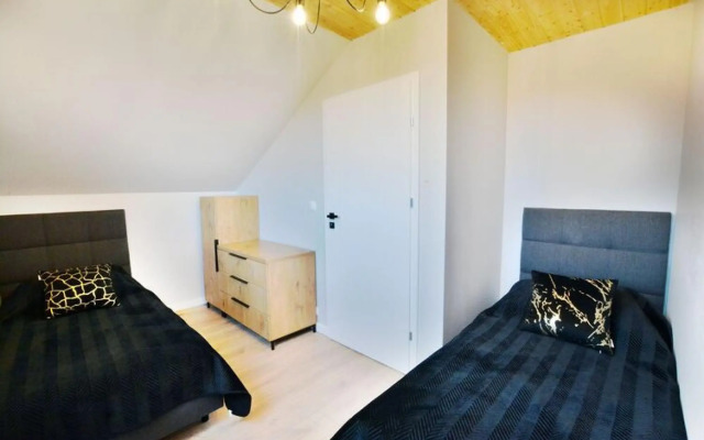 Holiday resort with sauna and jacuzzi, Mielenko