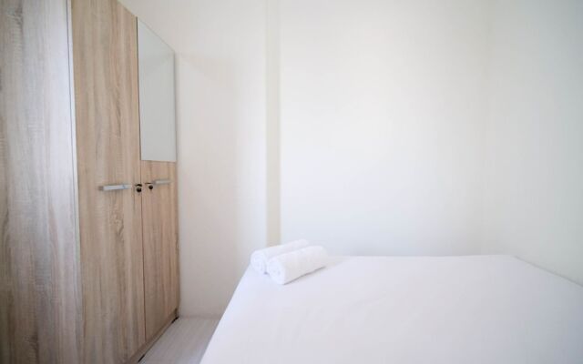 Cozy Living And Tidy 2Br At Puncak Dharmahusada Apartment