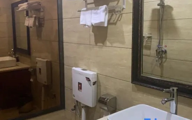 Bazhong Women's Theme Hotel (Rongbang Wanda Plaza City Traditional Chinese Medicine Hospital Branch)