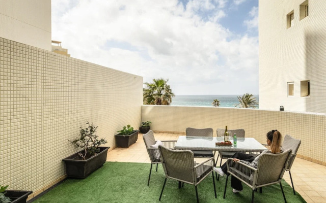 Seaside Escape with Private Patio by Sea N Rent