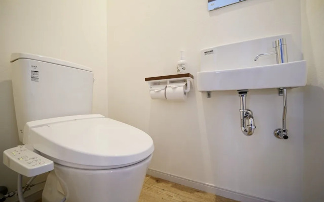 Coral Palace Onna by Sunset Avenue