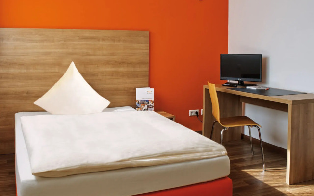 Orange Hotel und Apartments