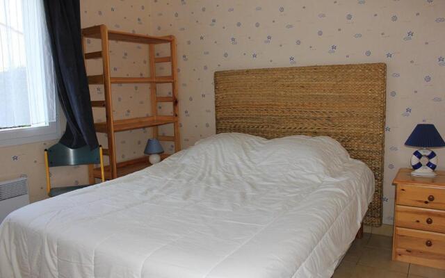 Une sympathique maison de vacances aux volets bleus