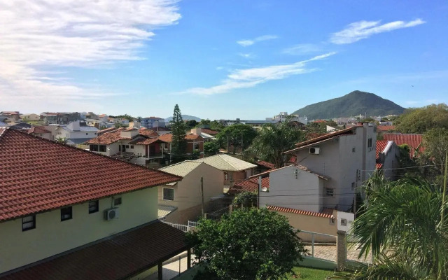 Ambiente Descolado 100m da praia e piscina