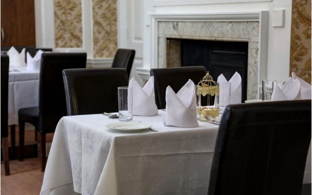 OYO Baylis House Hotel