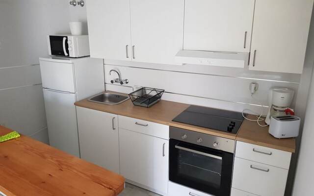 Sunny and spacious apartment with own entrance to pool