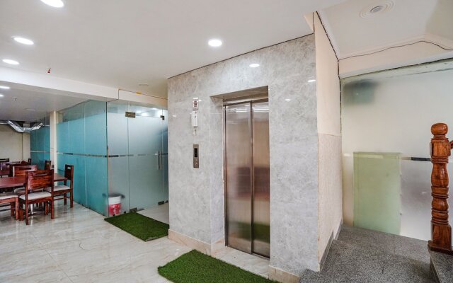 Fabhotel Ada Residency