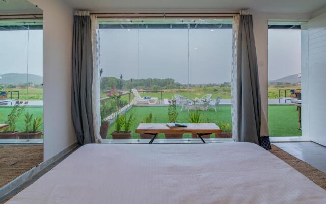 SaffronStays Onellaa, Nashik - infinity pool villa surrounded by a vineyard