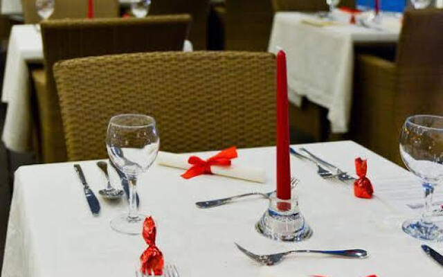 Vogue Apartments Room