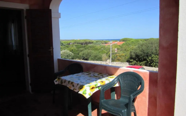 casa rosa nel residence mirice con piscina ,wifi,condizionatore - vicino al mare