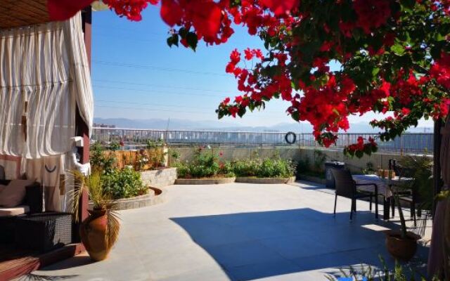 Xishuangbanna Rainforest Flower Valley Hotel (Gasa International Airport)