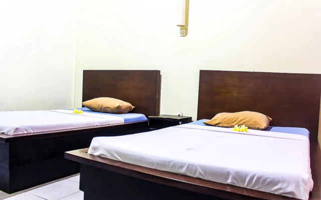 Budhi Beach Inn