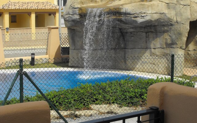 Livingtarifa - Bajo con acceso a piscina