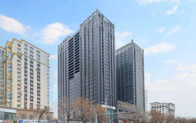 Baishichang Longquan Hotel (Urumqi International Grand Bazamin Street)