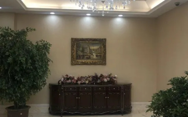 Ganghui Four Seasons Hotel Apartment (Dalian Railway Station Zhongshan Square)