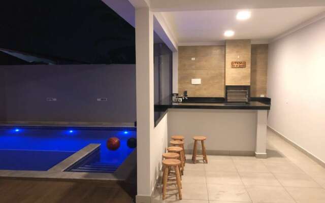 Casa com piscina em Caraguatatuba