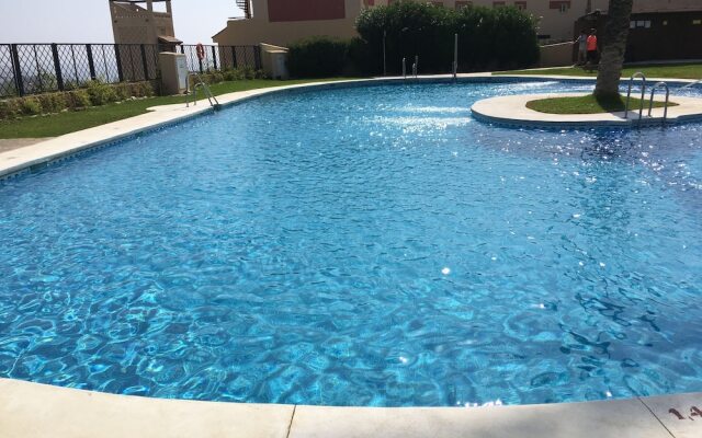 Penthouse sea views roof terrace communal pool