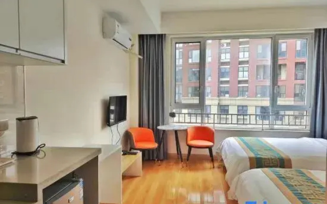 Shuimo Yijia Apartment (Qingte Town 204 National Road Branch)
