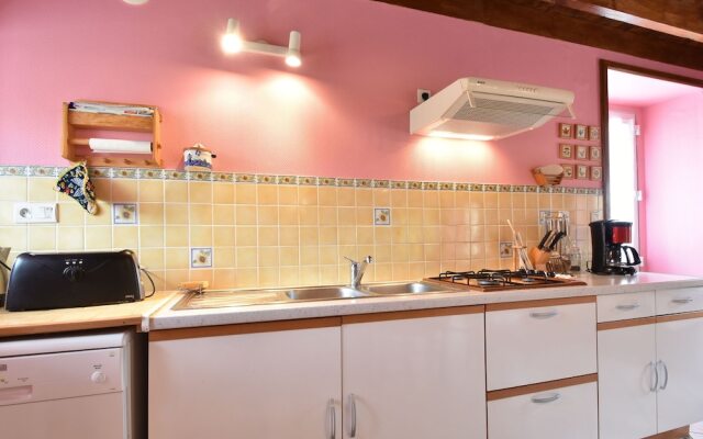 Cozy Holiday Home in Gourbesville France with Fireplace