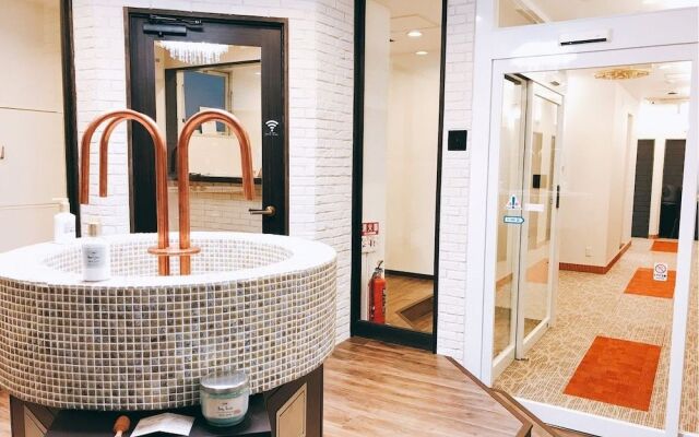 hostel & powder room crane - Caters to Women