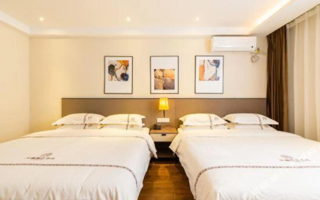 Tianxi Collection Hotel (Dalian Railway Station Youhao Square)