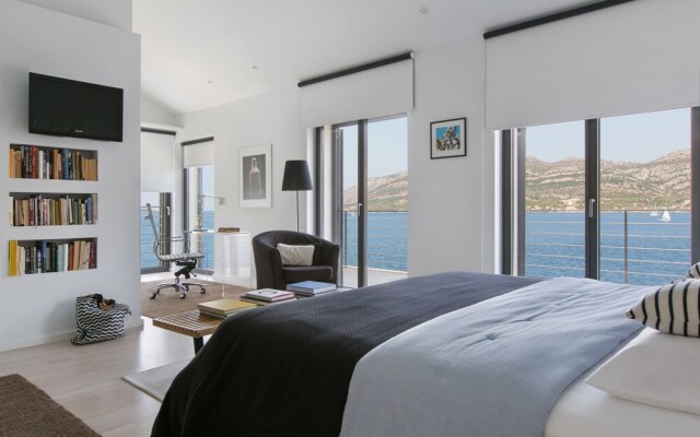 Beachfront Villa Poseidon with Heated Pool