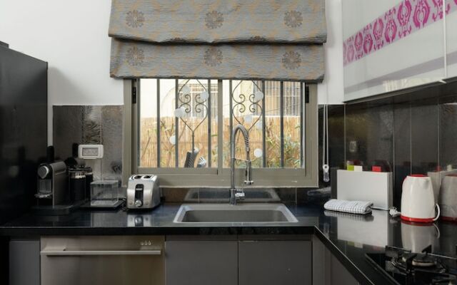 Family Apt & Private Garden near Beach by FeelHome