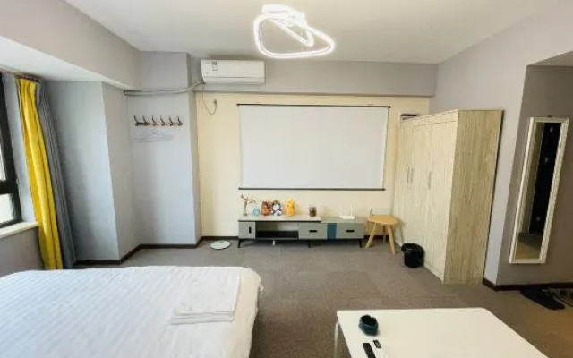 Orange Xinxiaozhu Happy Song Apartment (Shenyang Normal University Shop) – Guest Rooms – Shenyang