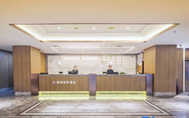 New Beacon Xinxilai International Hotel