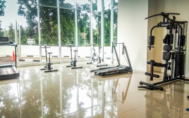 2BR Apartment with Sofa Bed at Woodland Park Residence By Travelio