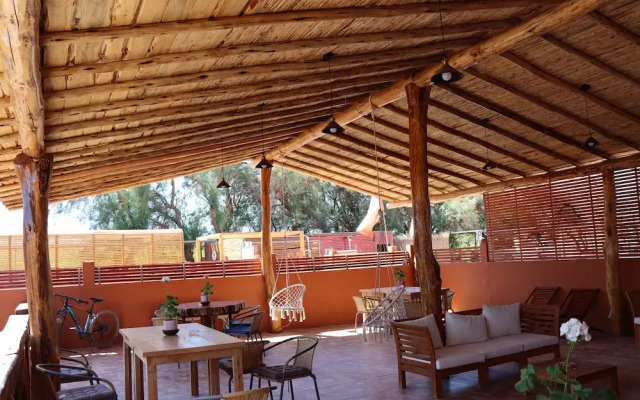 Peumayen Atacama / Hostal & Cabaña