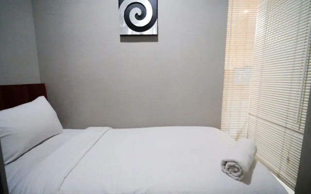Best Location And Tidy 2Br Apartment At Trillium Residence