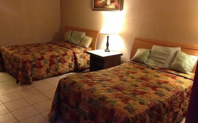 Su Casa Inn & Suites