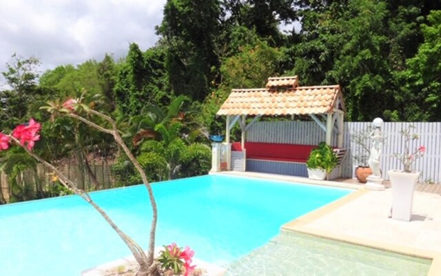 House With 2 Bedrooms in La Trinité, With Wonderful sea View, Pool Acc