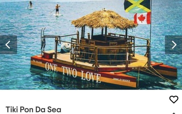 Seacret Studios - Cozy Jamaican Retreat Apts by RedAwning