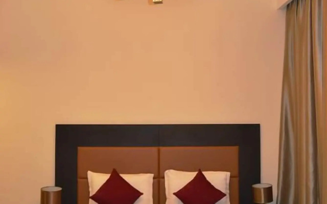 OYO 104 Q House 3 Apartments