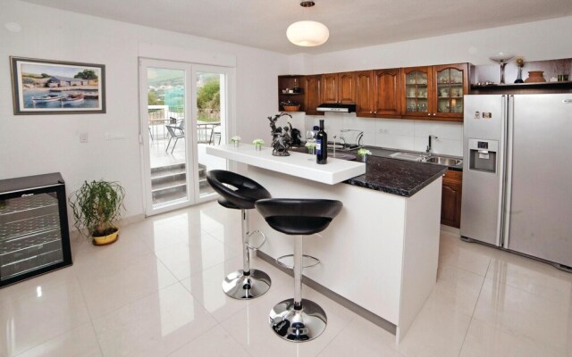 Awesome Home in Kucine Solin with Hot Tub, WiFi & 7 Bedrooms