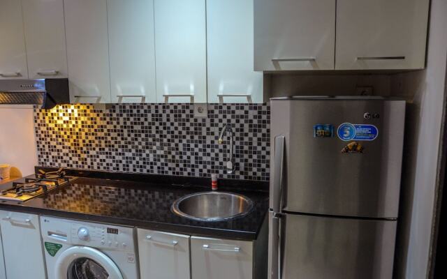 1 Bedroom at Cosmo Mansion Apartment by Travelio
