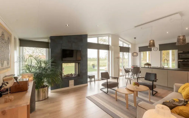 Modern Chalet With a Fireplace