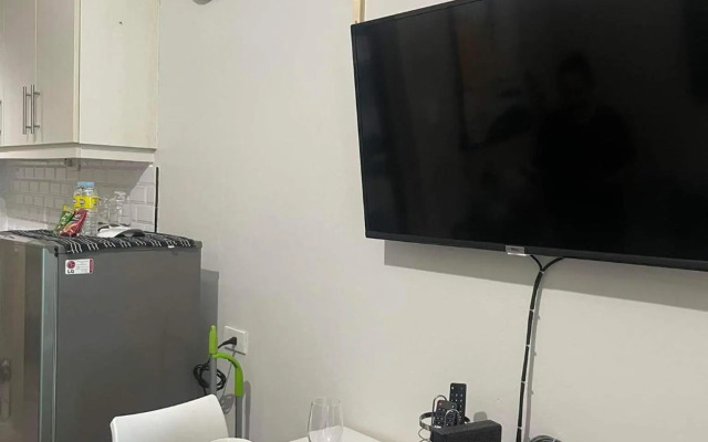 Sea Residences MOA Arena, SMX 1BR free wifi & Netflix